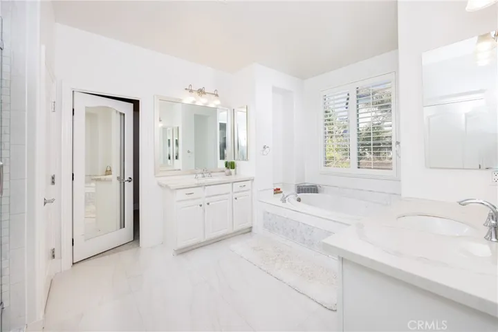 Primary bedroom bathroom suite