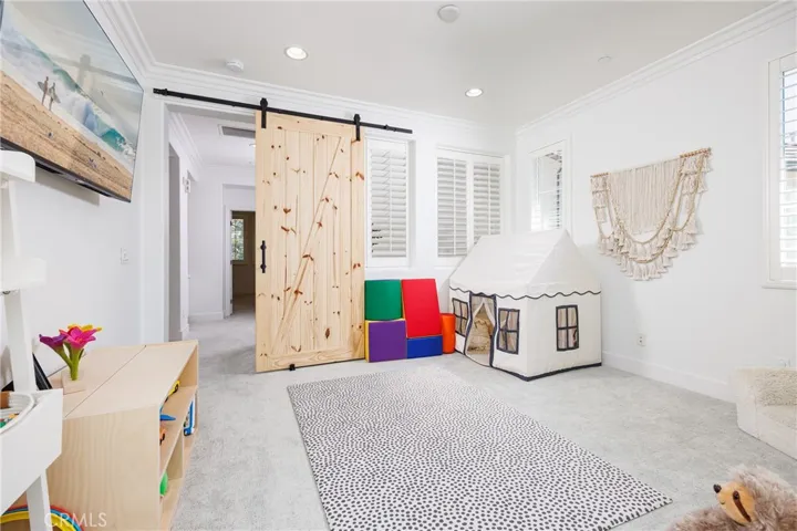 Upstairs loft; with added barn door could be used as a 4th bedroom