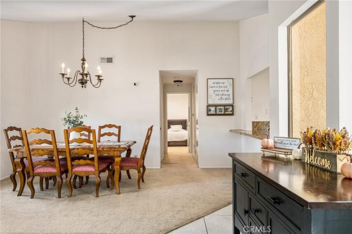 Dinning room is open to kitchen bartop