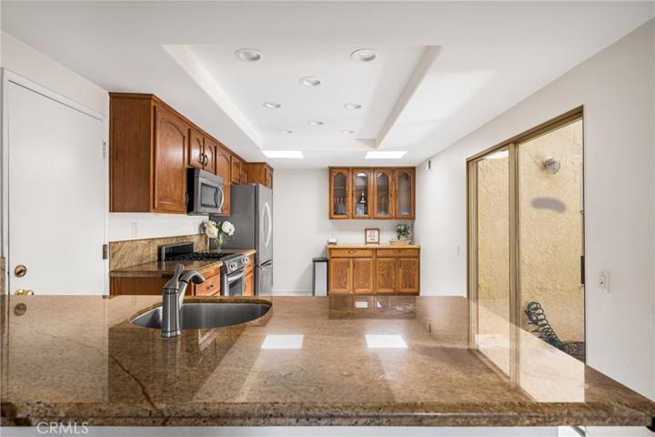 Kitchen opens to atrium