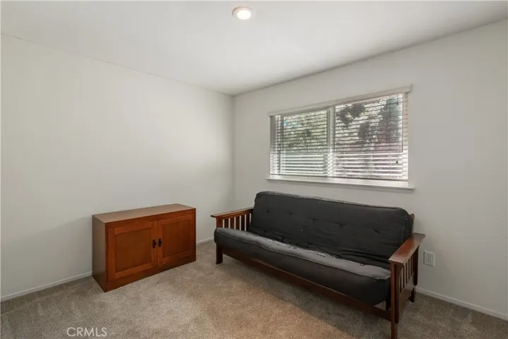 One of the bedrooms with neutral colored paint.