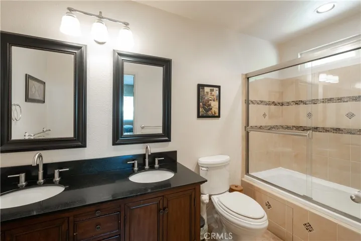 Double sinks and a jetted tub unit in this upgraded master bath.