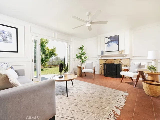 French doors with sidelights flood this room with natural light.