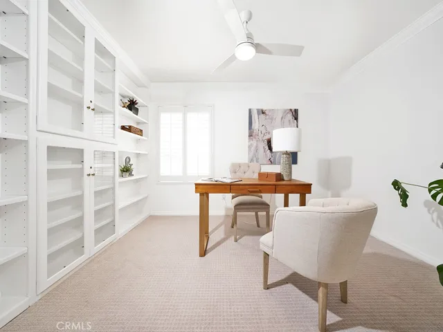 Main level office with built ins could easily be the 5th bedroom!
