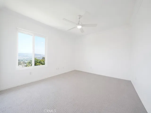 Secondary upstairs bedroom with views