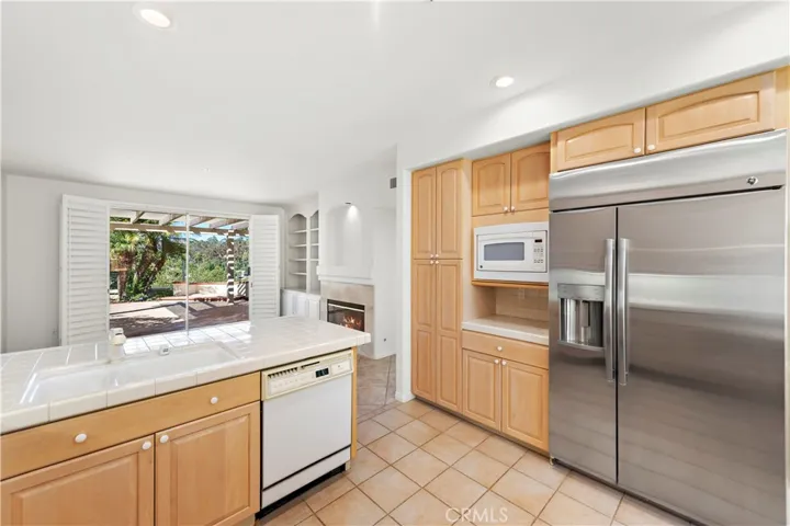 view from the kitchen to the adjoining family room