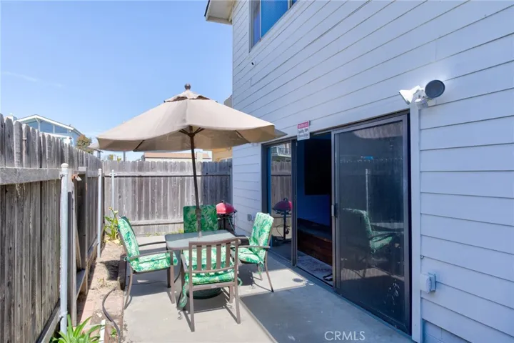 Back patio off of pool area to the west