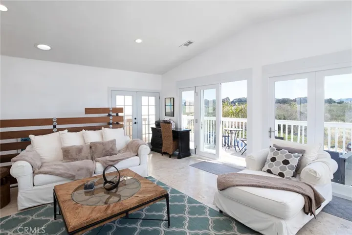 Great room and views toward the lagoon and green space