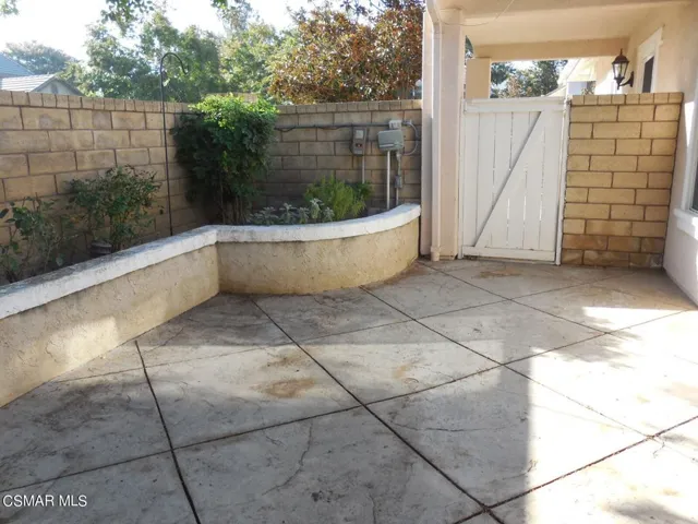 Gate entry to side patio