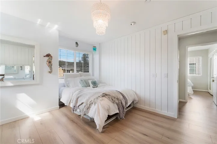 Primary bedroom with shiplap walls