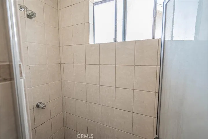 Walk in shower by living room