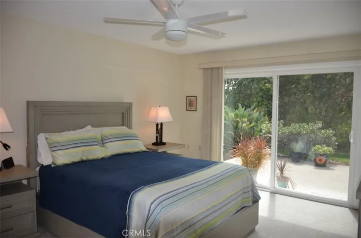 Master bedroom with slider to back patio