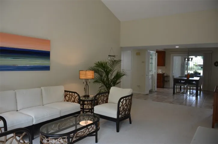 Living room looking back to dining area and kitchen