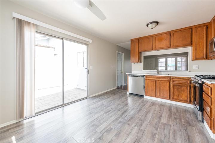Kitchen showing sliding door leading onto patio area