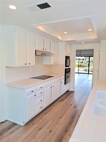 Kitchen with pass through to dining / Living rooms