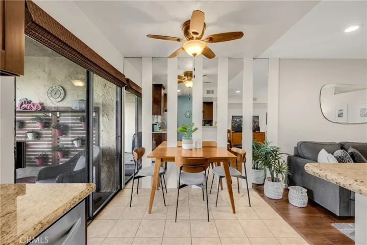 Dining Room with Sliding Glass Door Leading Out to the Private Balcony Area