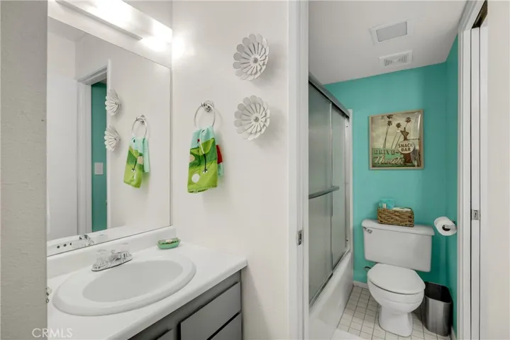 Separate Sink Area & Toilet for Bedroom 2 and Combined Tub/Shower Shared Between Both Rooms