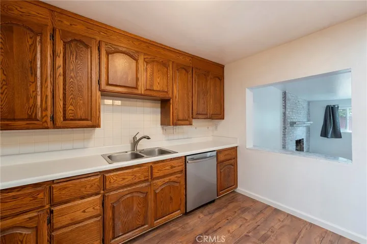 Kitchen has pass through to family room