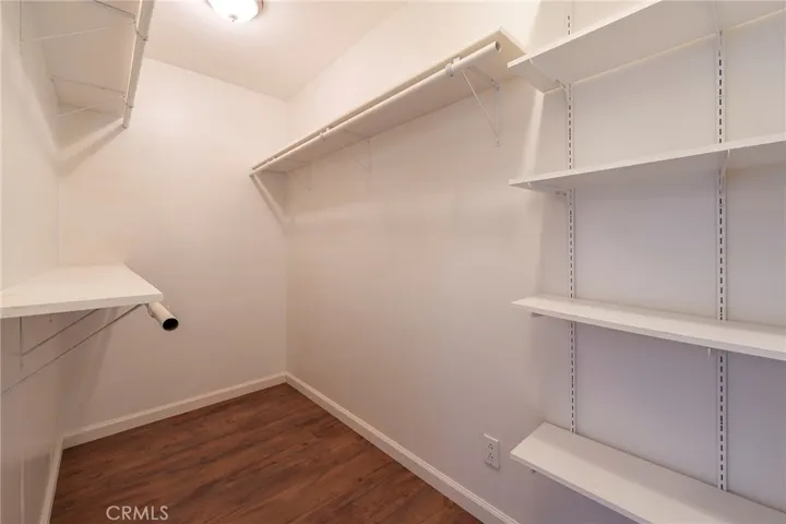 Primary Bedroom walk in closet
