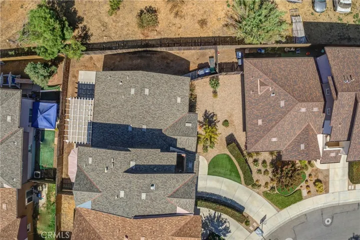 Aerial view with front and back yard.