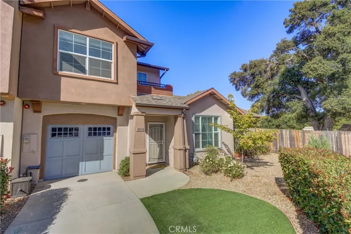 Corner lot with nicely landscaped front yard.