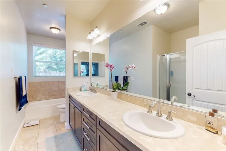 Master Bathroom with soak tub and walk in shower.