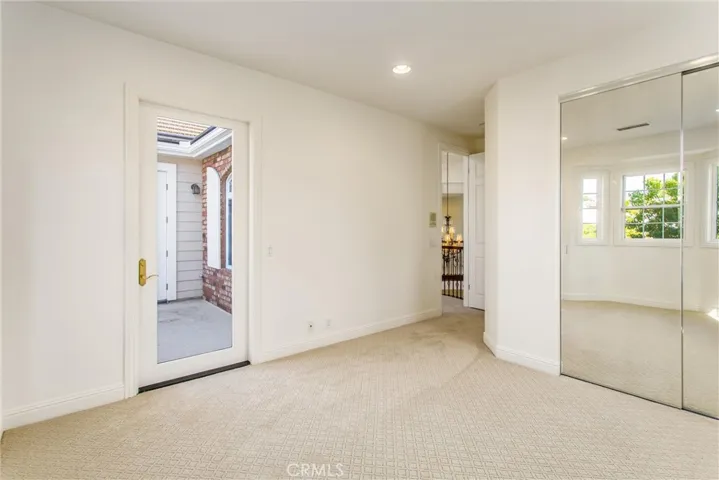 1st upstairs bedroom with full bath and balcony