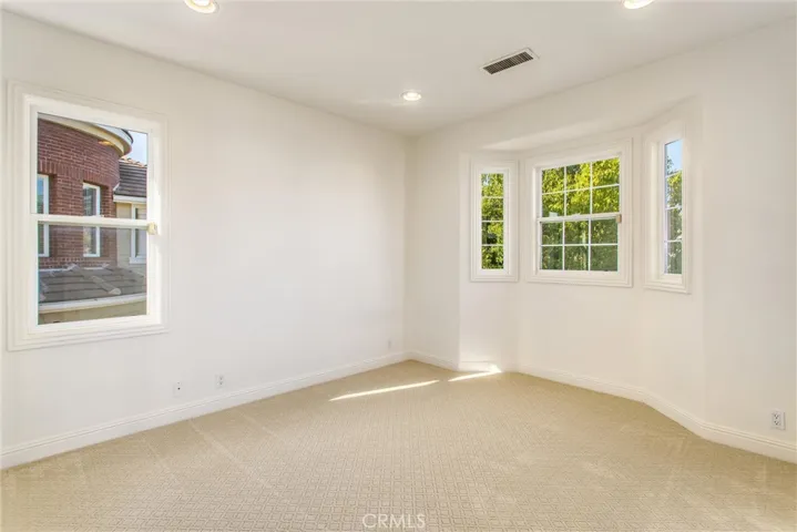 1st upstairs bedroom with full bath and balcony