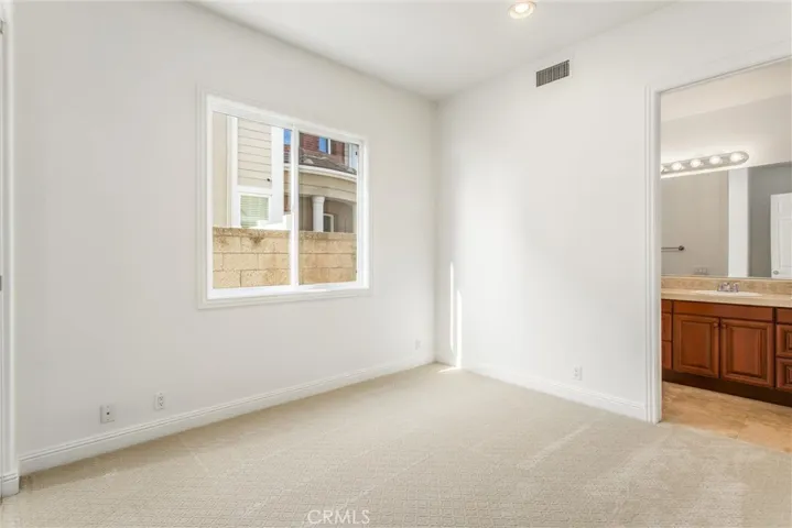Downstairs bedroom with full bath