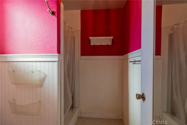 Primary bedroom private bathroom and shower.