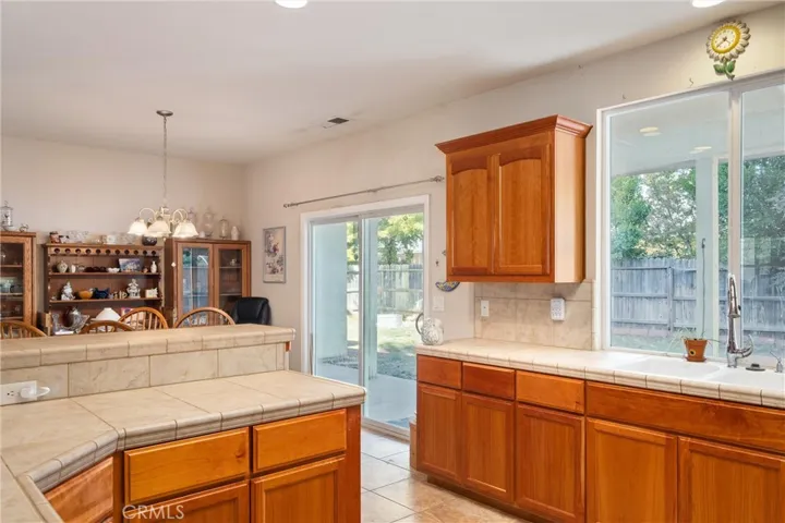 Nice breakfast bar and lots of window space looking out to rear yard