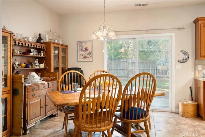 Tiled dining area adjacent to kitchen