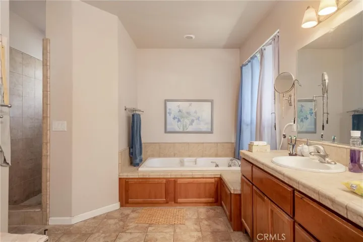 Jetted tub with separate walk in shower
