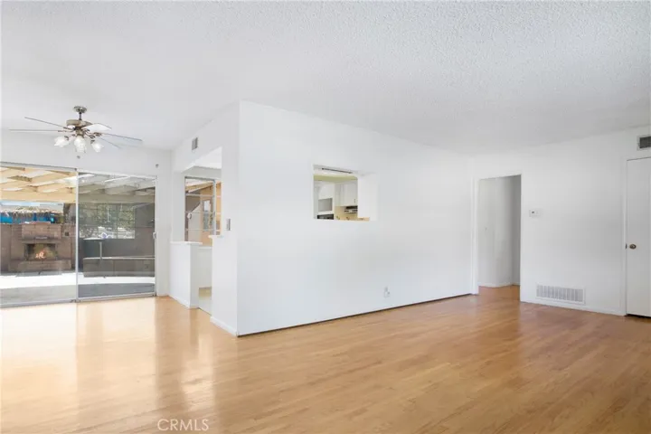 Original hardwood floors throughout just recently exposed after carpet was removed.
