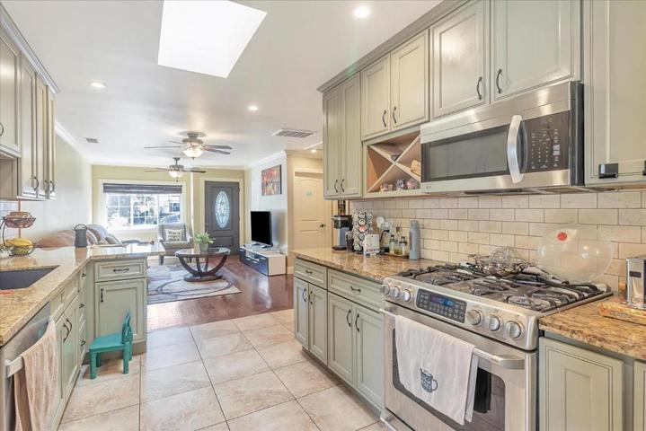 #116 Kitchen Facing Entry & Living Room