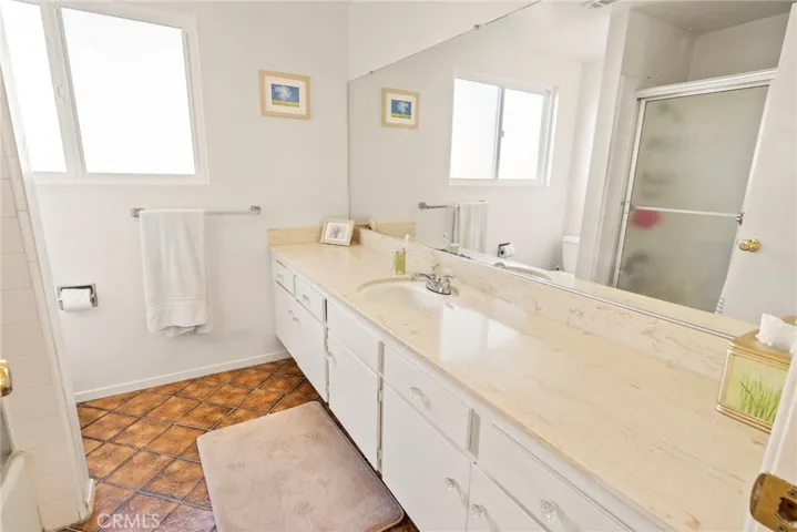 Second upstairs Bathroom. Large vanity and tub/shower combination.