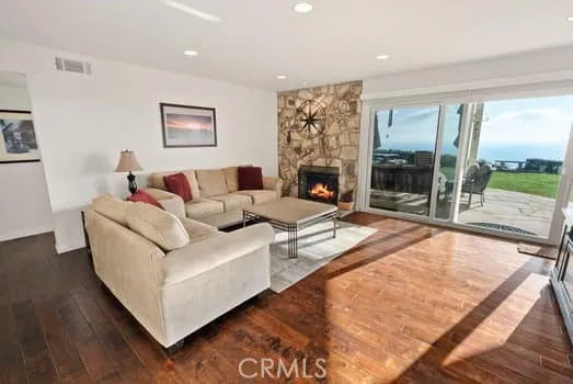 At ground level you will find a cozy Family Room with PV Stone details. Direct access outside to entertain or just sit and watch the sunsets.
