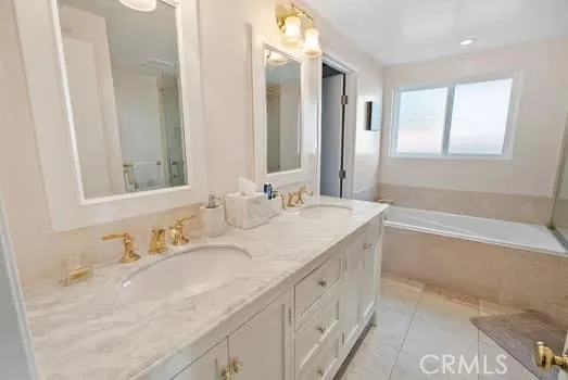 Another View of the primary bathroom. Door to large walk in Closet