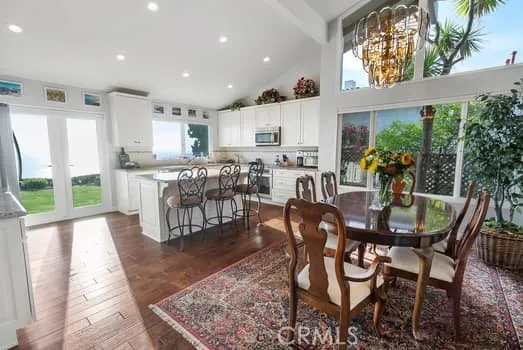 Dining Room with bright wall of glass.
