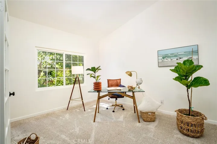 Second bedroom staged as an office