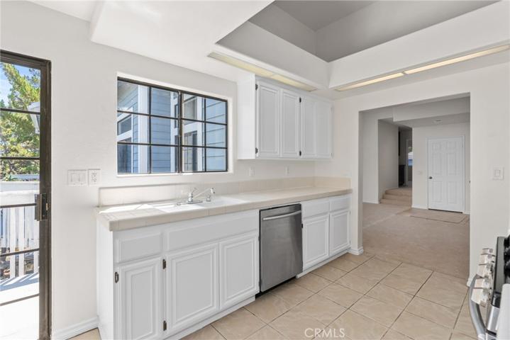 Cook with a view in the kitchen, conveniently located near the balcony!