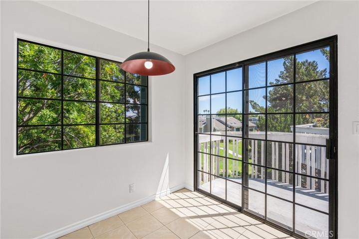 Sliders open to a balcony overlooking nature!