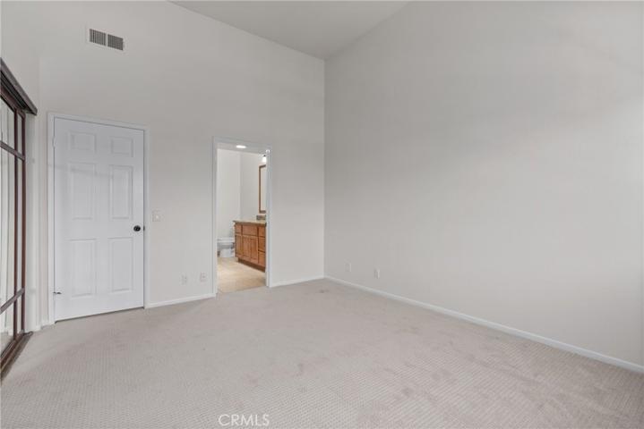 The owner's suite offers ample storage with a wall-to-wall closet.