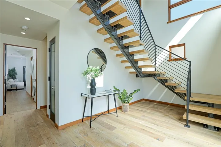 Entry look toward downstairs suite