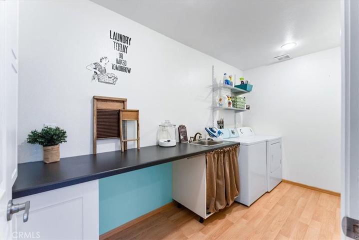 Laundry room with sink