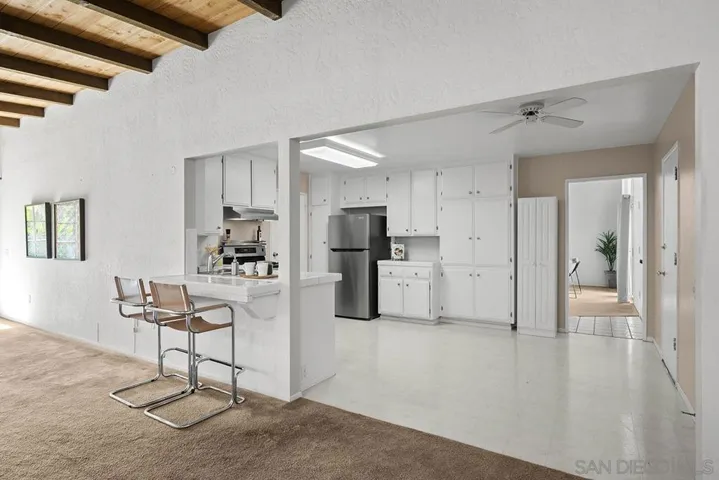 Adjacent to dining area and family room