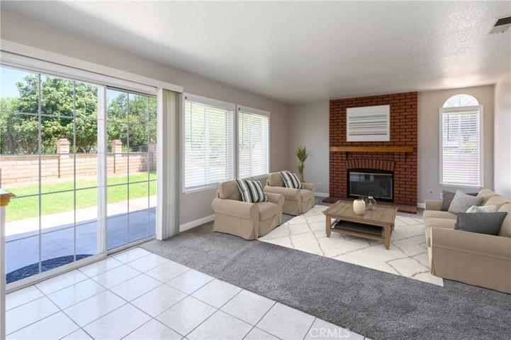 FAMILY ROOM WITH FIREPLACE VIRTUAL STAGING