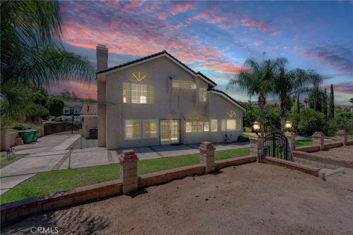 TWILIGHT REAR VIEW OF THE HOUSE