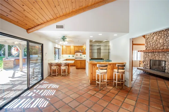 Family room overlooking kitchen and living room