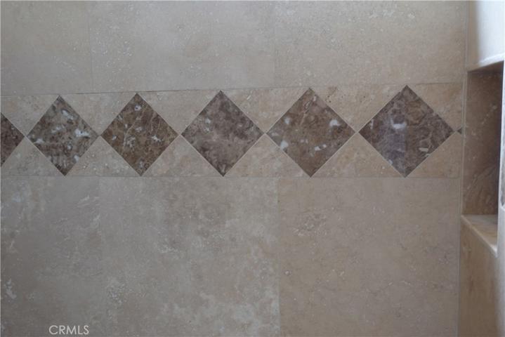 Travertine and Marble Shower in Master